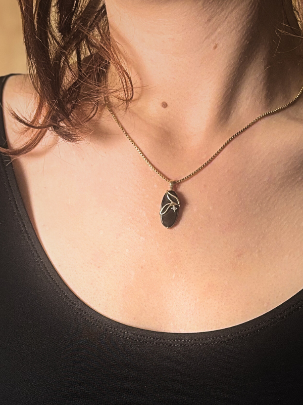 14K Oval Onyx with a Diamond Pendant