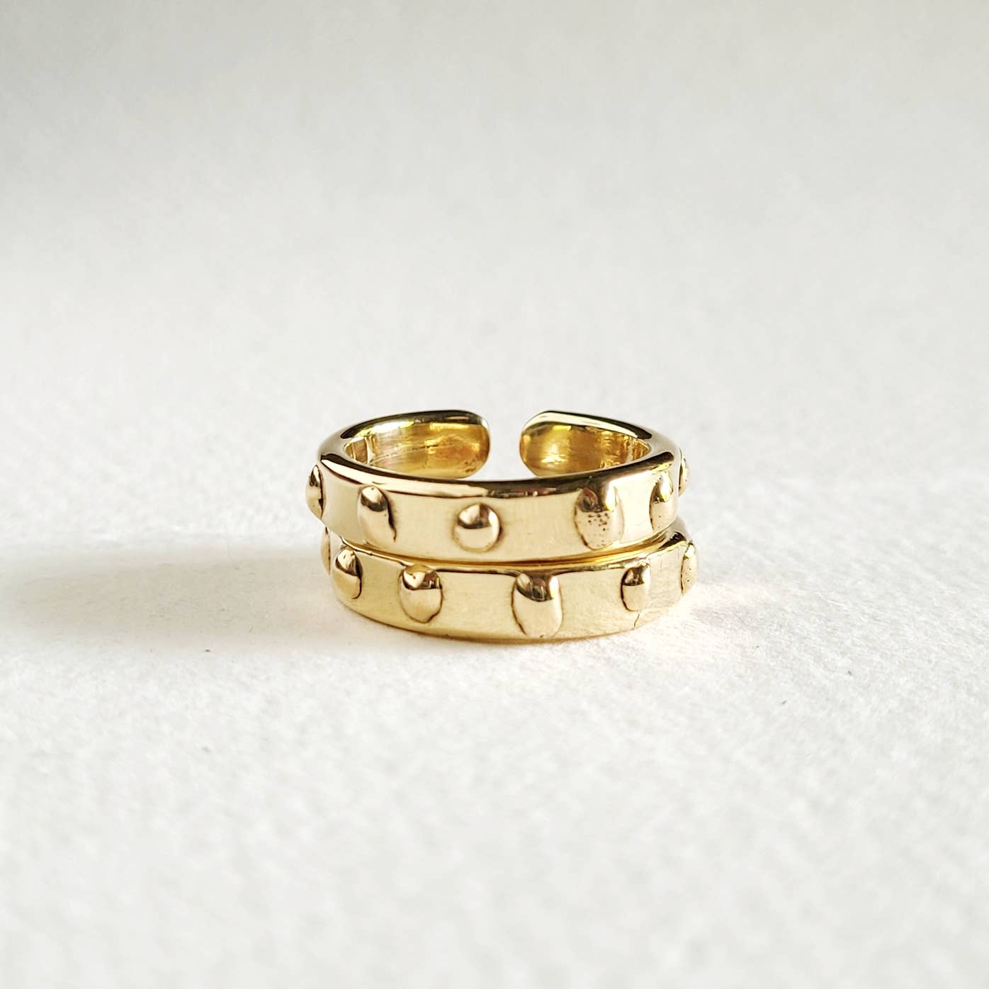 Brass droplet ring band stacking