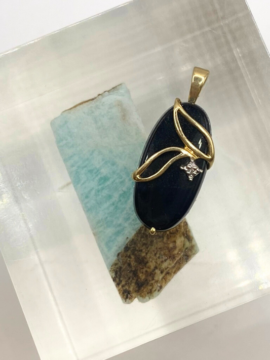 14K Oval Onyx with a Diamond Pendant