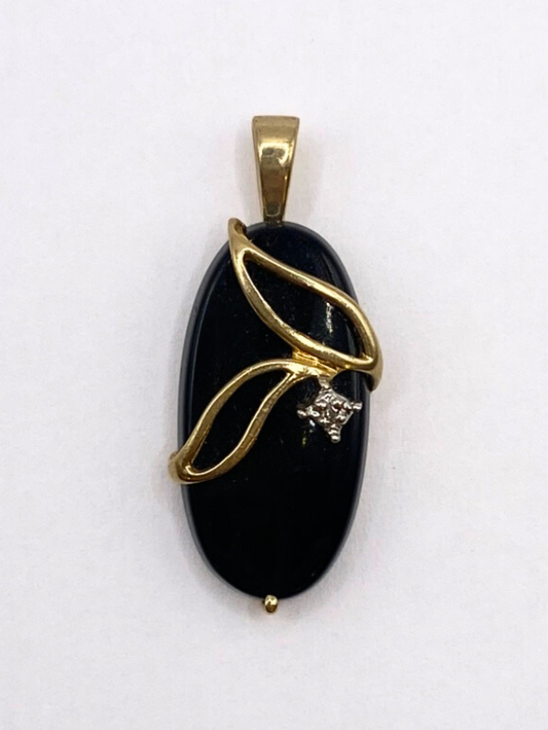 14K Oval Onyx with a Diamond Pendant