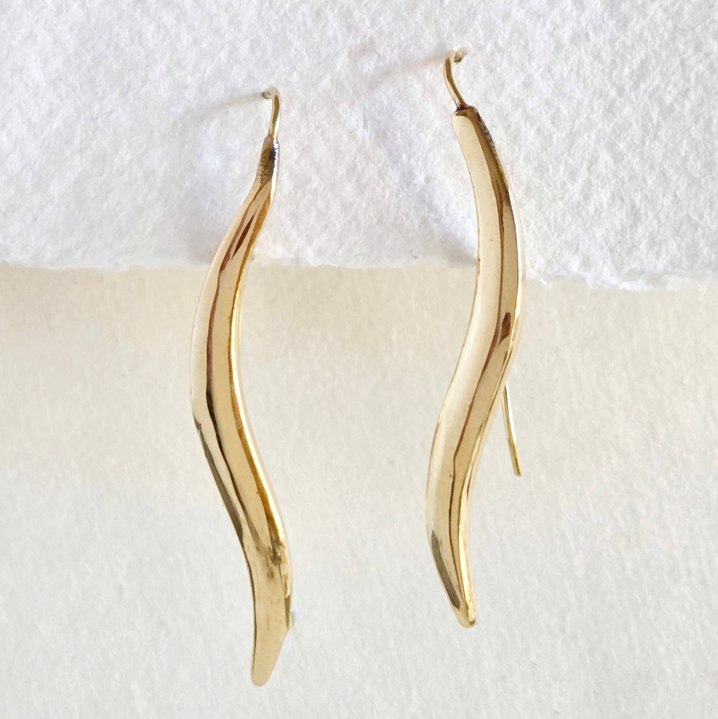 Brass leaf smooth modern elegant swerve earrings