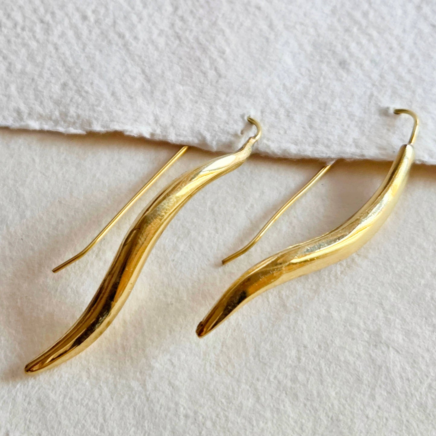 Brass leaf smooth modern elegant swerve earrings